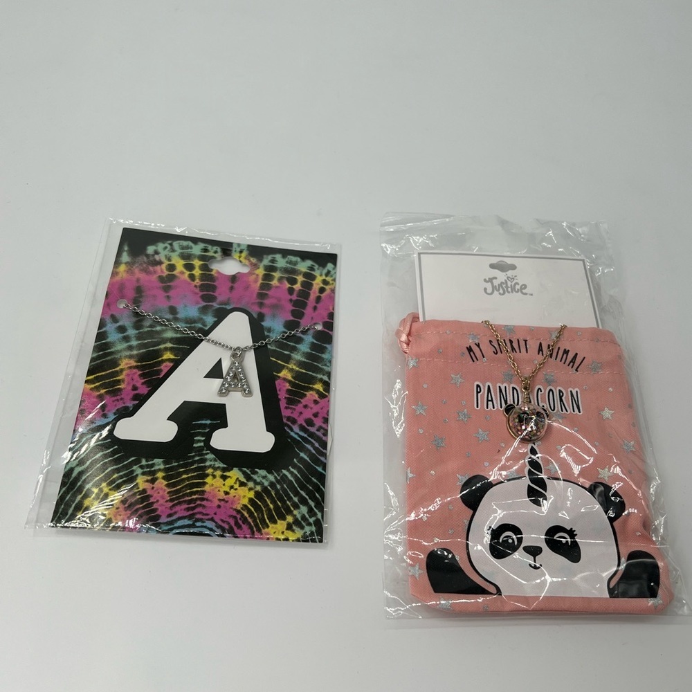 Justice necklaces 1 A letter necklace and 1 panda necklace both new necklaces